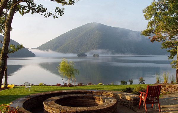 A View of Lakeside Mountains From the Gravel