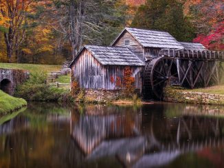 Image Showing A Lonely Calm Wooden House along with river