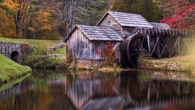 Image Showing A Lonely Calm Wooden House along with river